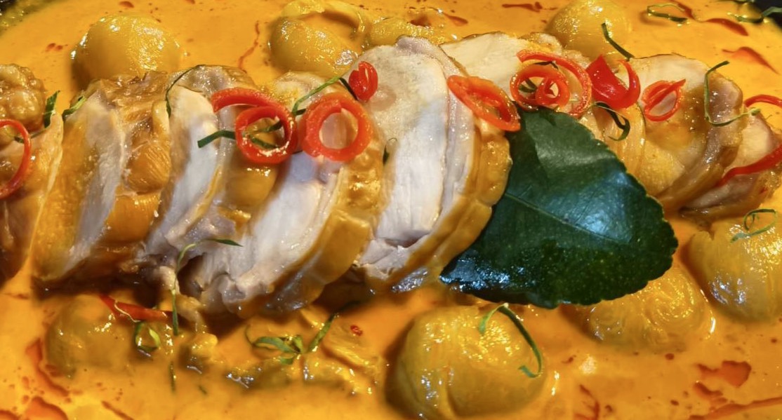 Home PJ Tavern Smoked Chicken Panang Curry with Fresh Longan – Signature Thai Fusion Dish in Pattaya